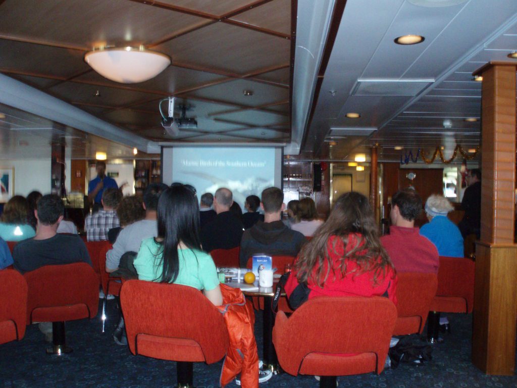 People sitting in lecture room