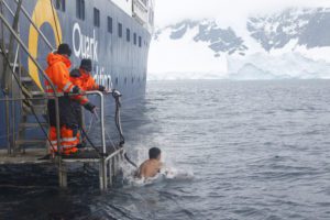 Teenager swimming in Southern Ocean