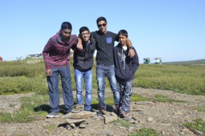 Happy teenager friends posing