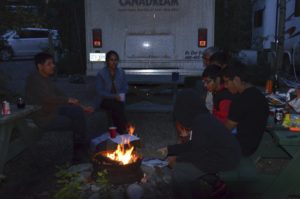 People around campfire